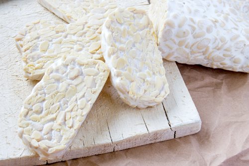 Sliced-fresh-raw-tempeh-on-cutting-board-Tempeh-is-very-famous-Indonesian-food-made-from-soya-bean_shutterstock_423220189.jpg Sliced-fresh-raw-tempeh-on-cutting-board-Tempeh-is-very-famous-Indonesian-food-made-from-soya-bean_shutterstock_423220189.jpg